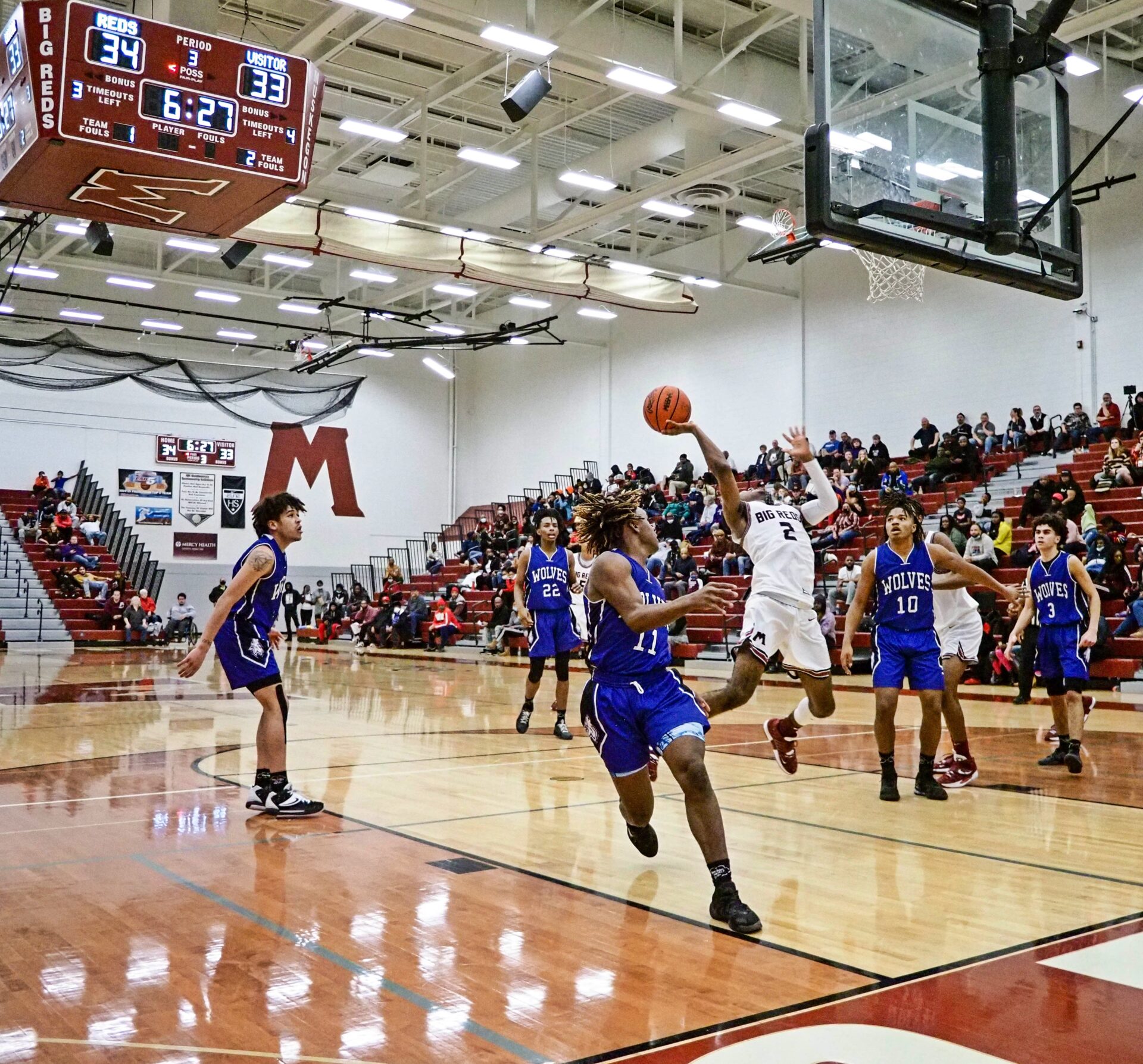 Muskegon Big Reds overcome a sluggish start, blast Wyoming 82-59 to ...