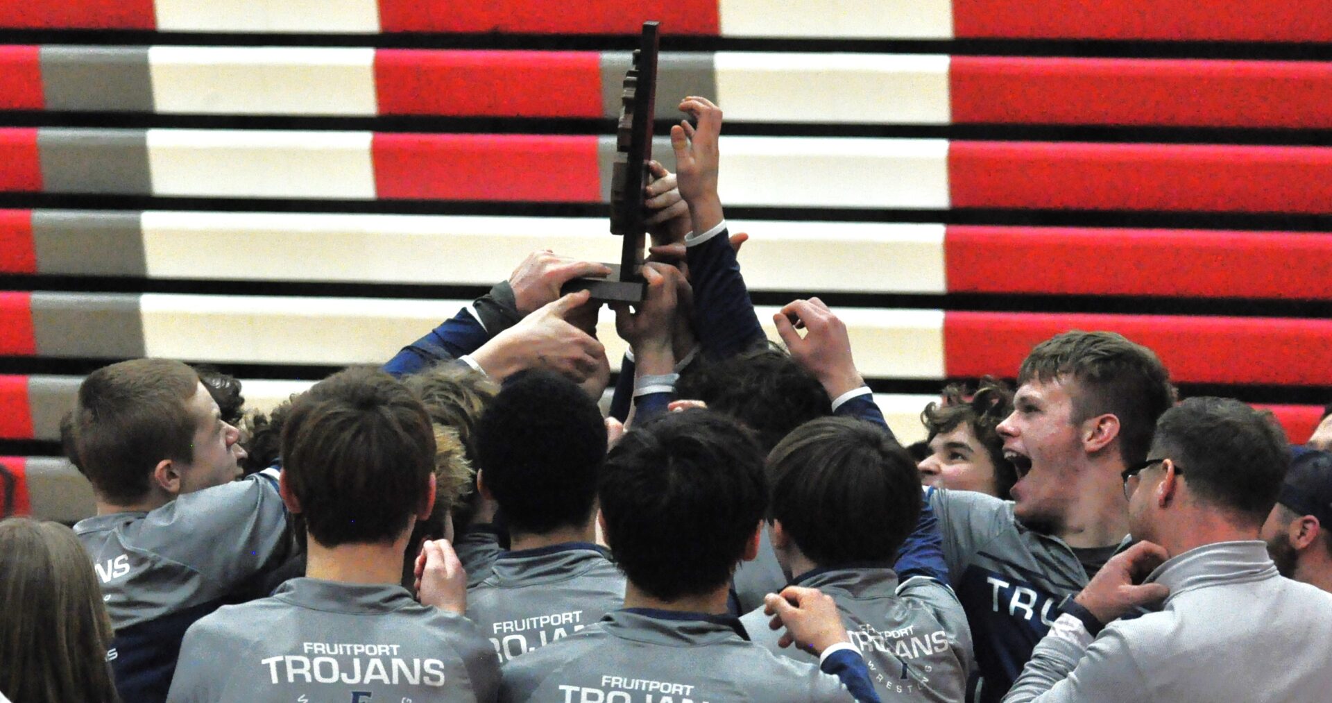Fruitport wrestling team rolls past Fremont, Big Rapids to win its